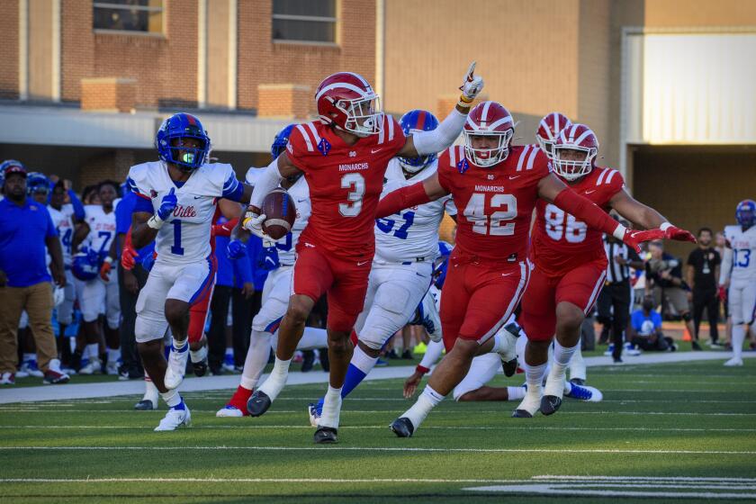 Duncanville, TX - August 27: Mater Dei cornerback Domani Jackson (3) runs for a touchdown against Duncanville high school in Panther Stadium on Friday, Aug. 27, 2021 in Duncanville, TX. (Jerome Miron / For the LA Times)