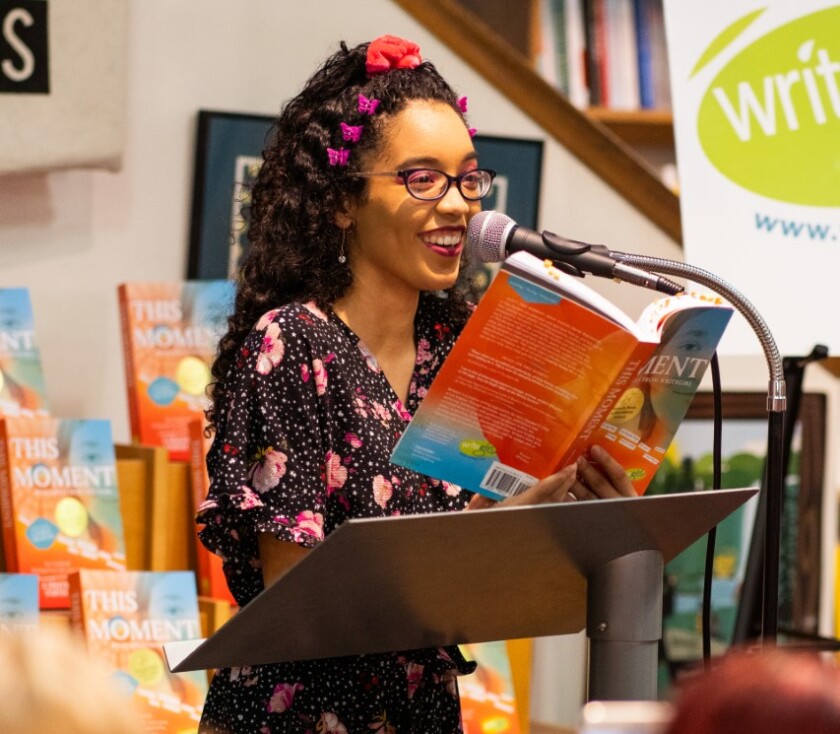 WriteGirl alum Samantha Campbell reads at a WriteGirl event at Skylight Books last year.