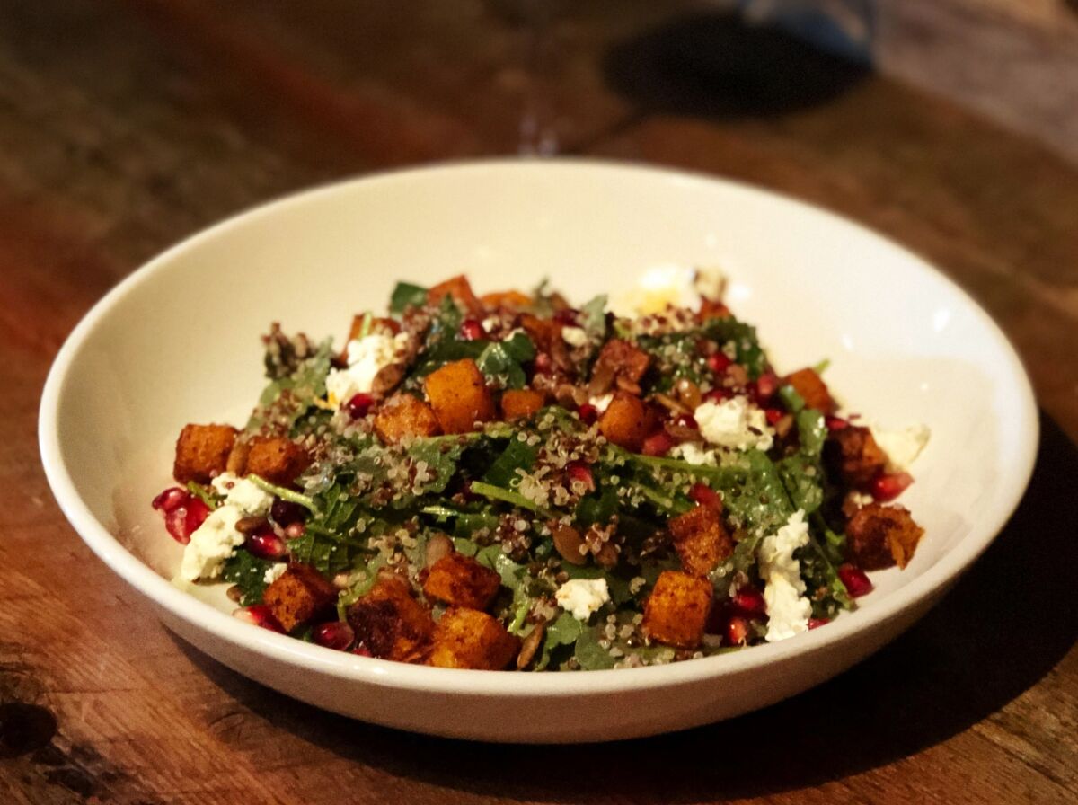 Spiced butternut and baby kale salad with roasted pepitas, quinoa, pomegranate seeds and goat cheese, one of new executive chef Michael Welch's fall menu, rolling out in early November, at Union Kitchen & Tap in Encinitas.