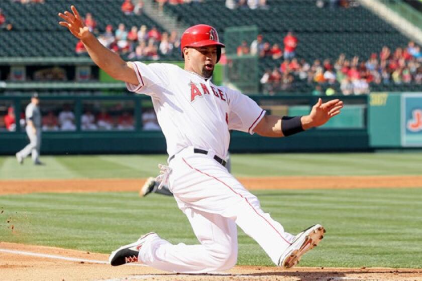 Albert Pujols went two-for-four at the plate with an RBI and scoring a run in the Angels' 7-1 victory over the Seattle Mariners.