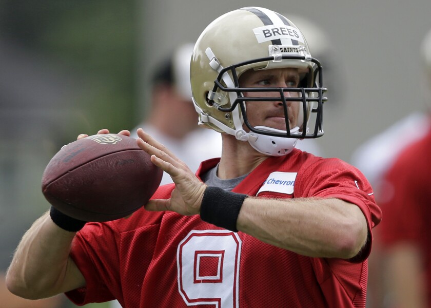 New Orleans quarterback Drew Brees participates in minicamp in June.