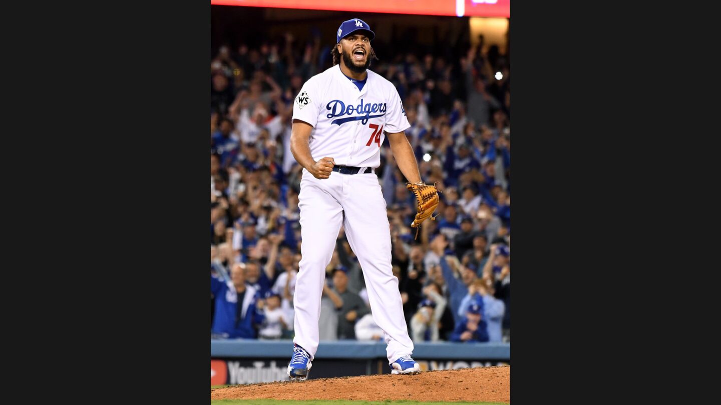 Kenley Jansen celebrates at the end of the game after striking out Astros' Carlos Betran in Game 6.