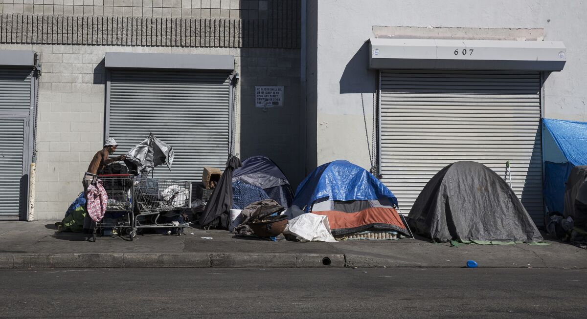 An encampment of homeless people along 6th Street on skid row this week.