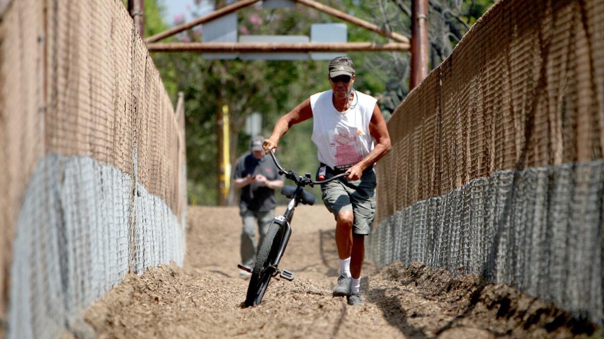 Burbank resident and cycling enthusiast Doug Weiskopf is opposed to the prohibition of walking bicycles across Mariposa Street bridge, which spans the L.A. River from Burbank to Griffith Park.