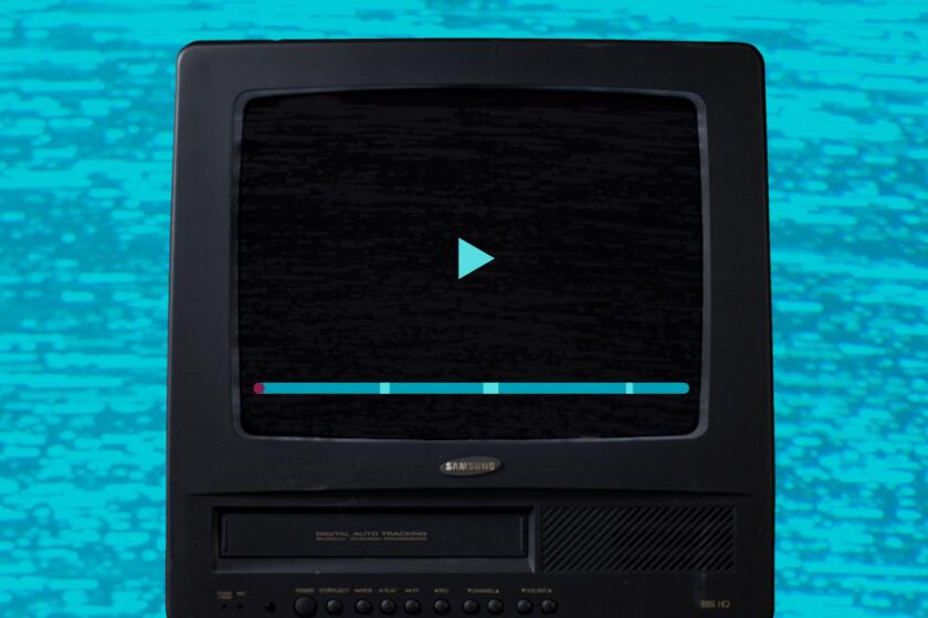 an older model TV set with a play button and progress bar on the screen