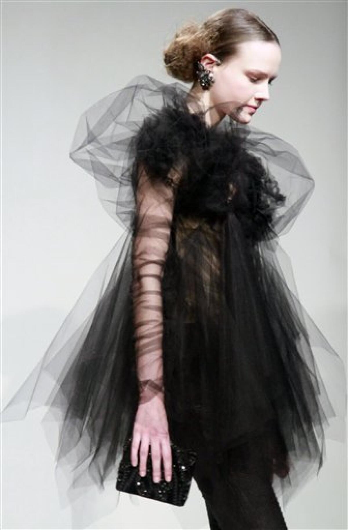 Fashion from the fall 2011 Marchesa collection is modeled on Wednesday, Feb. 16, 2011 in New York. (AP Photo/Bebeto Matthews)