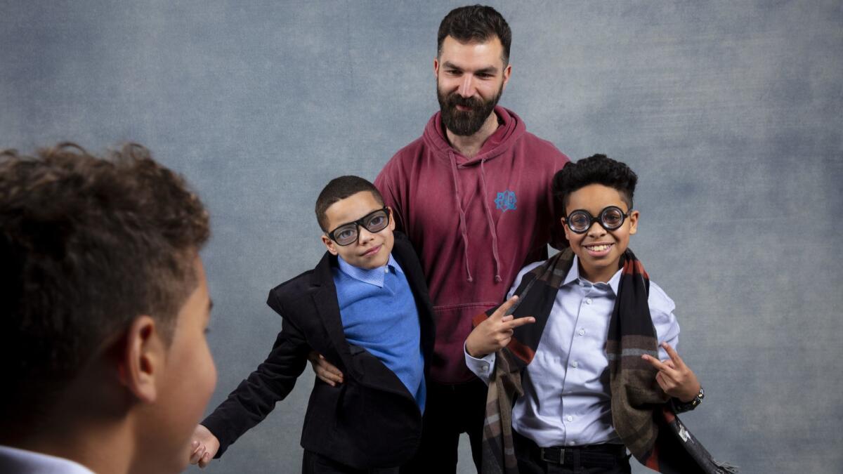 Director Jeremiah Zagar with, from left, Isaiah Kristian, Evan Rosado and Josiah Santiago from the film, "We The Animals," at the L.A. Times Studio during the Sundance Film Festival in Park City, Utah, in January.