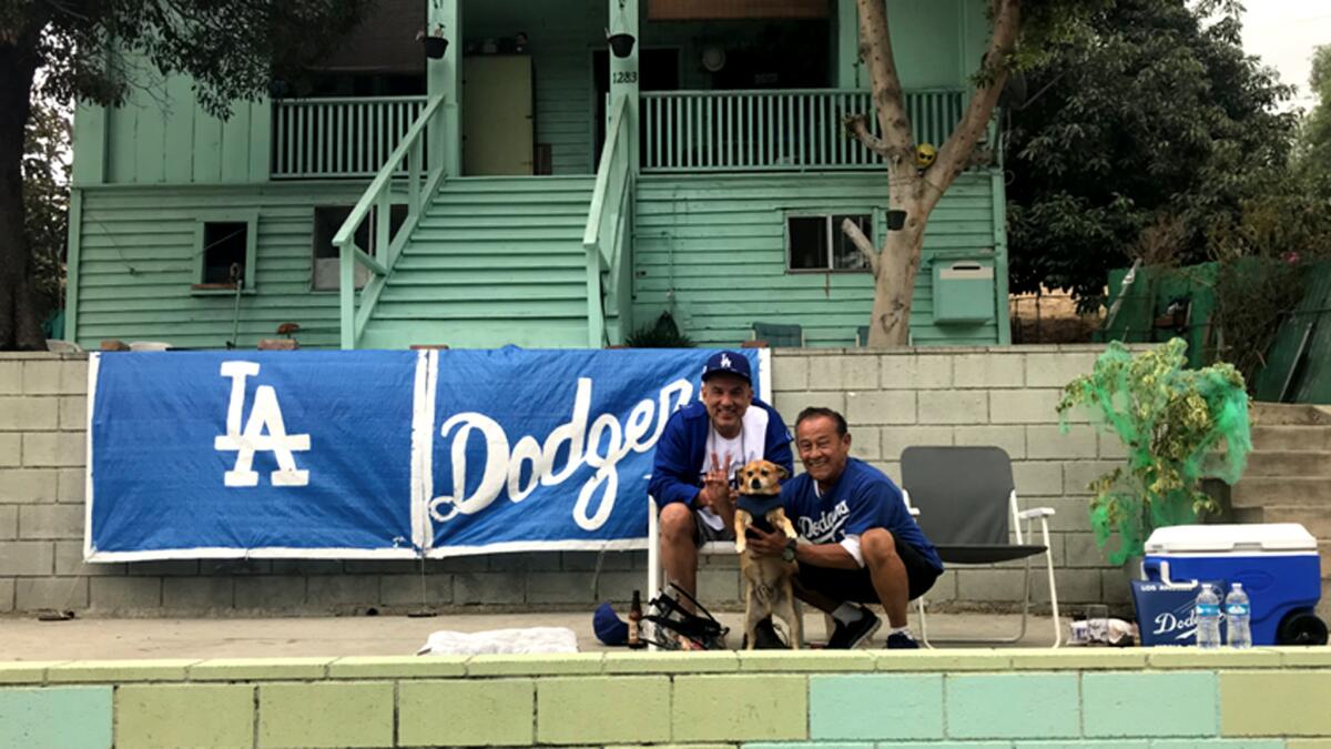 Terry Morris and Joe Martinez at Martinez's home along Sunset Boulevard