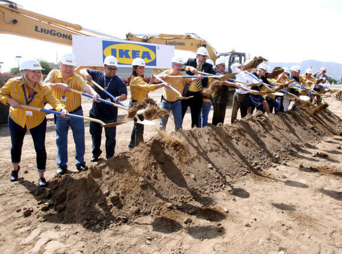 IKEA employees and city officials throw the ceremonial dirt as construction begins for the new IKEA in Burbank on Tuesday, Sept. 1, 2015. When completed, the new 456,000 sq. ft. store, on 22 acres on San Fernando Rd., will be the largest one in the United States.