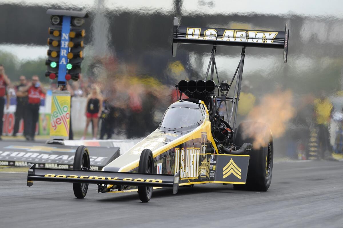 Tony Shumacher races to victory on Aug. 30 in Clermont, Ind., at the NHRA U.S. Nationals.