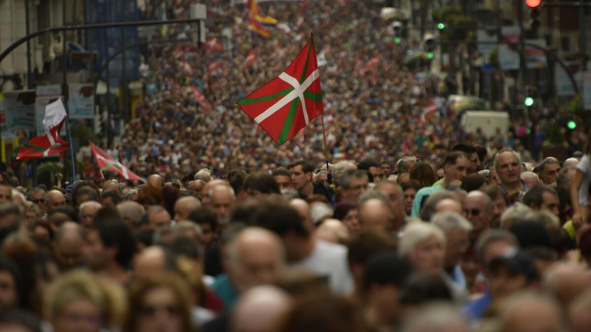 Protesters march in Bilbao, Spain, on April 21, 2018, to demand that imprisoned members of the militant Basque group ETA be moved closer to home. Hundreds are in Spanish and French prisons, mostly outside the Basque region.
