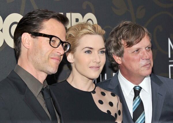 "Mildred Pierce," the new HBO mini-series based on James M. Cain's 1941 cult novel (which memorably became a 1954 movie staring Joan Crawford), casts Kate WInslet, center, as the titular character trying to make it all in her post-divorce, post-Great Depression Southern California world. Guy Pearce, left, plays Mildred's new flame, Monty Beragon, while Todd Haynes, right, directed the project.