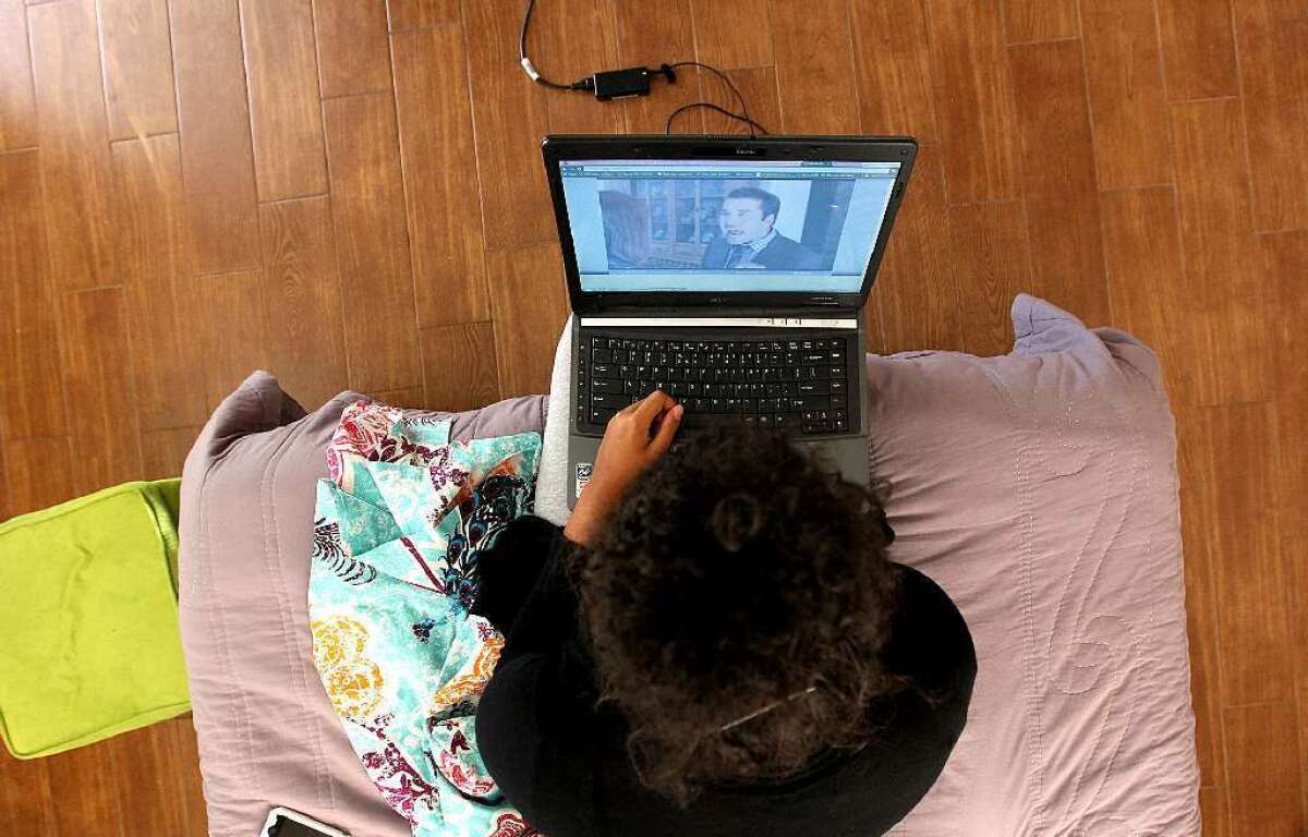 The 1998 Digital Millennium Copyright Act, crafted when Internet users were moving from slower dial-up connections to broadband, was obsolete almost from the start. Above, a USC student watches a program on her laptop.