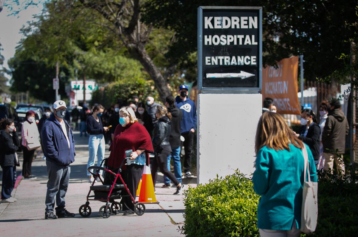 Long lines of people wait outside Kedren Community Health Center 
