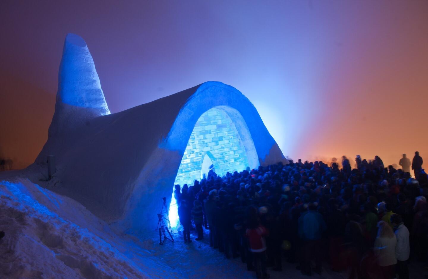 A crowd forms outside the ice church shortly after its opening.