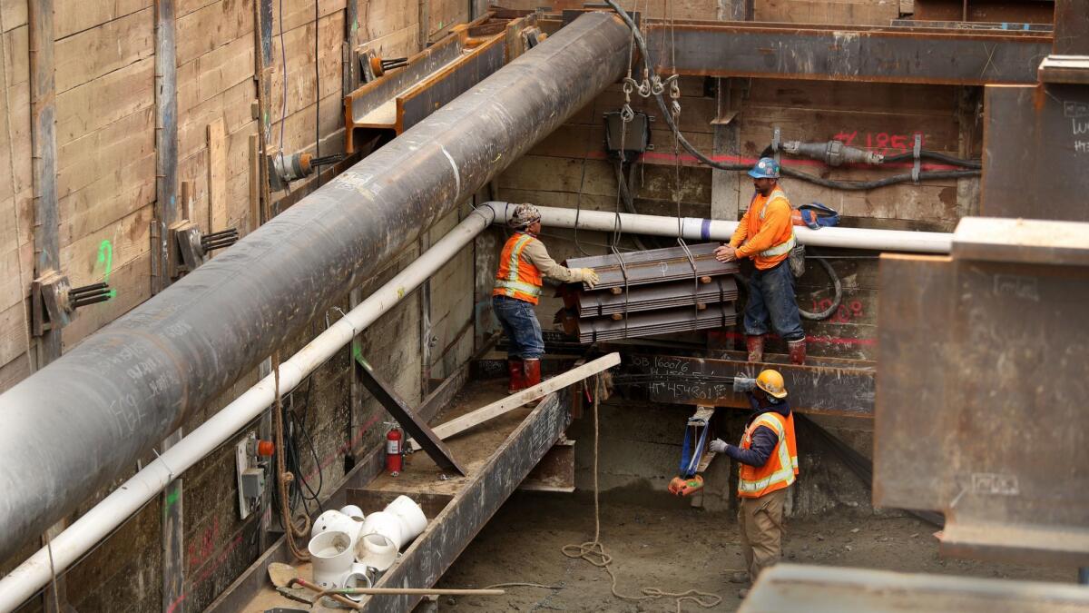 Construction of the Purple Line is underway at La Brea and Wilshire on January 4, 2017. The second phase of the Purple Line subway, which will connect Beverly Hills and Century City to downtown Los Angeles by rail, has received billions in federal grants and loans.