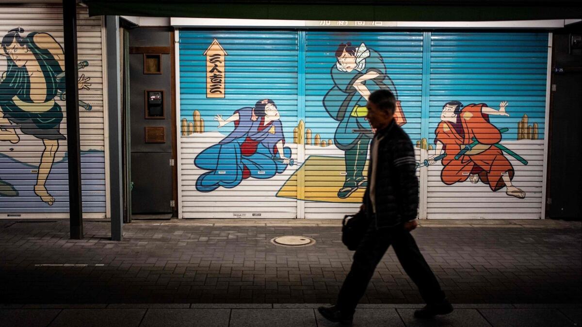 A man walks in a stretch of Tokyo's Asakusa area.