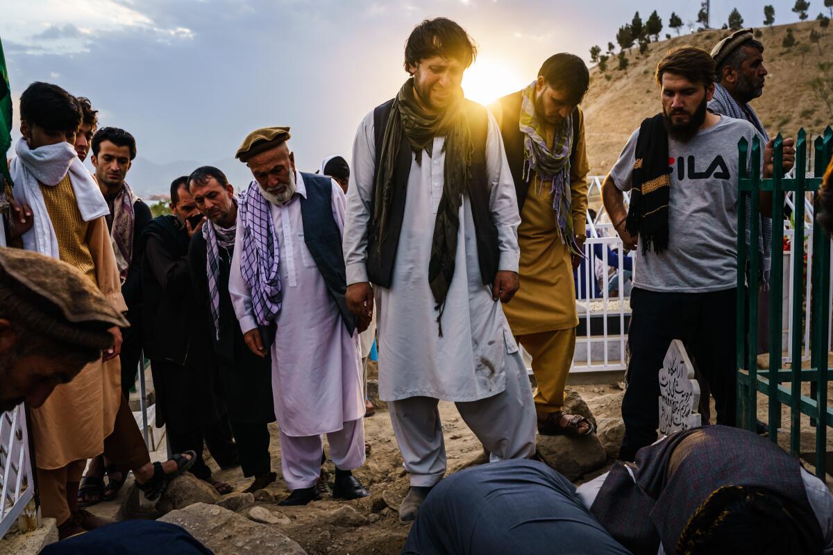 Ajmal Ahmadi grieves for his family, all 10 civilians that were killed in a U.S. drone airstrike, in Kabul, Afghanistan