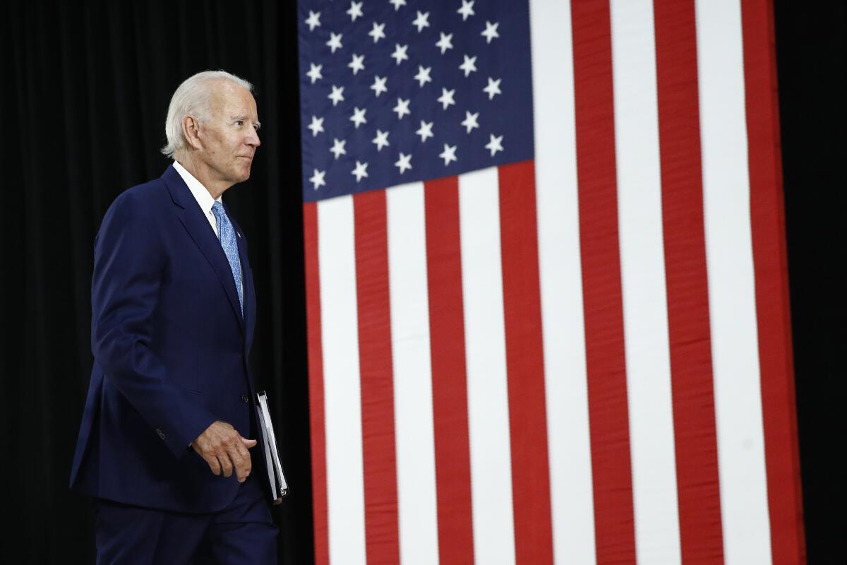 Former Vice President Joe Biden leaves stage