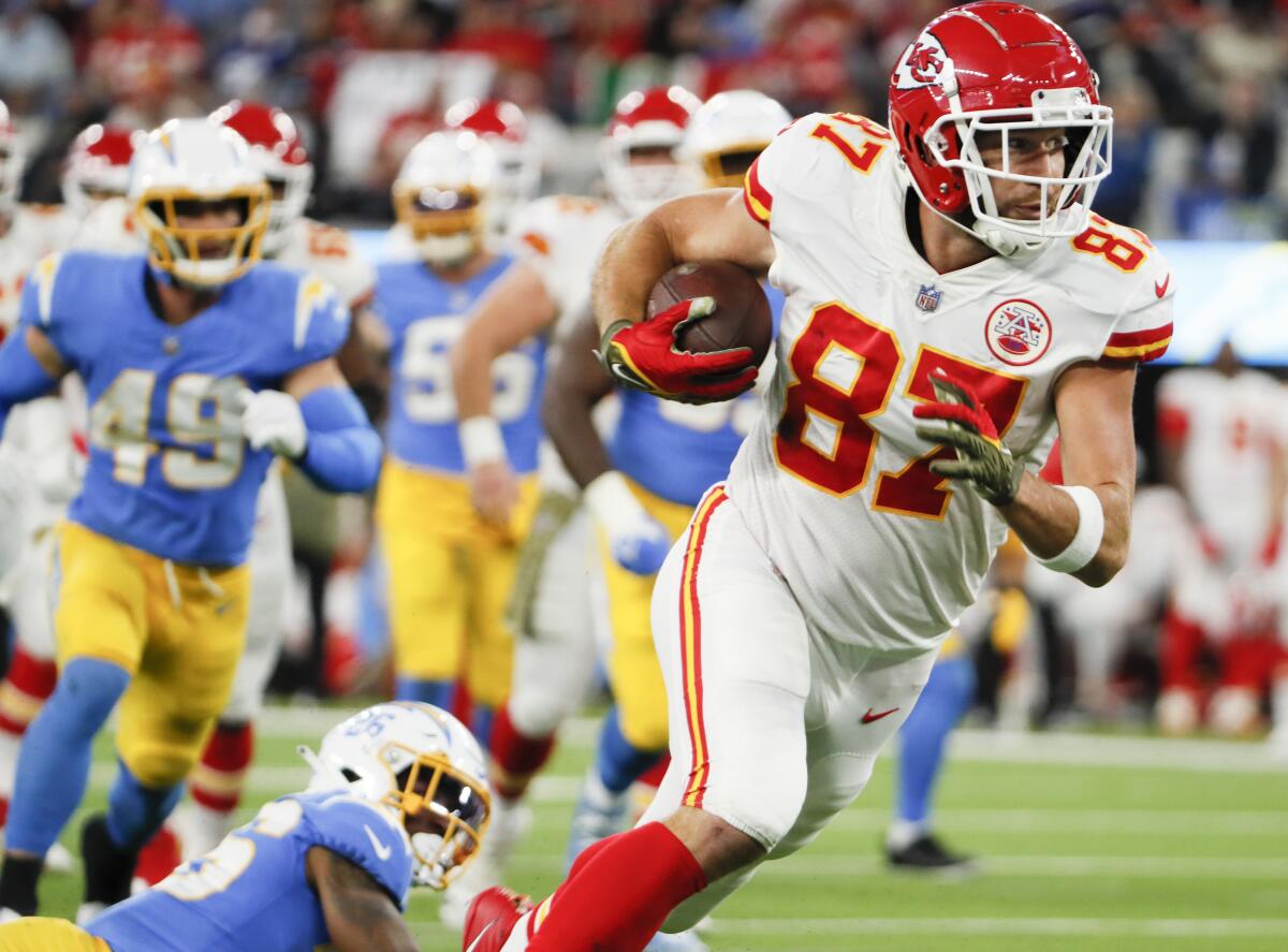 Kansas City Chiefs tight end Travis Kelce runs after a catch to score a touchdown in the fourth quarter.
