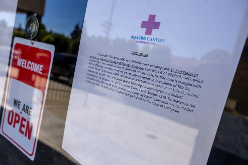 Calabasas, CA - August 21: Sign posted in the window of Dr. Salvador Plasencia's clinic on Wednesday, Aug. 21, 2024 in Calabasas, CA. (Brian van der Brug / Los Angeles Times)