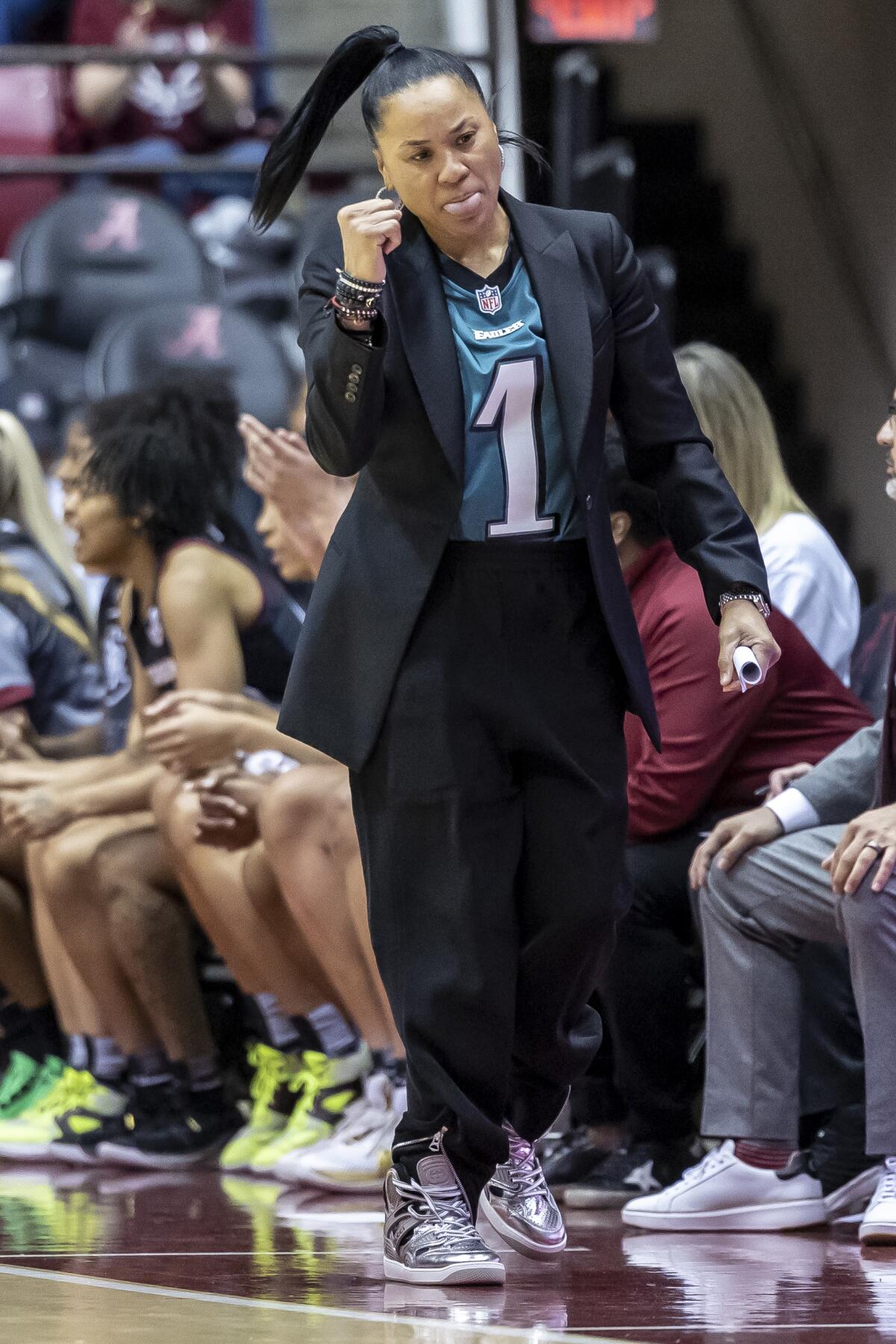 South Carolina head coach Dawn Staley, second from right, with