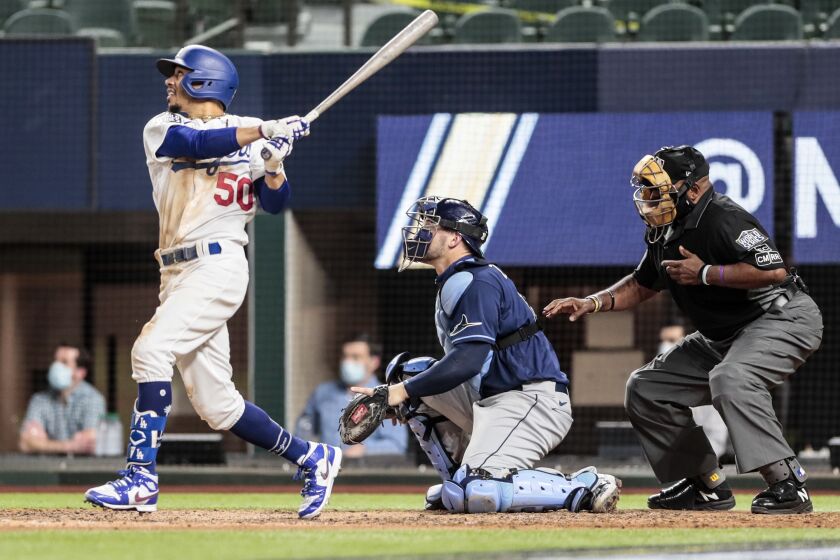 Arlington, Texas, Tuesday, October 20, 2020 Los Angeles Dodgers right fielder Mookie Betts (50) homers against Tampa Bay Rays starting pitcher Tyler Glasnow (20) in the sixth inning in game one of the World Series at Globe Life Field. (Robert Gauthier/ Los Angeles Times)