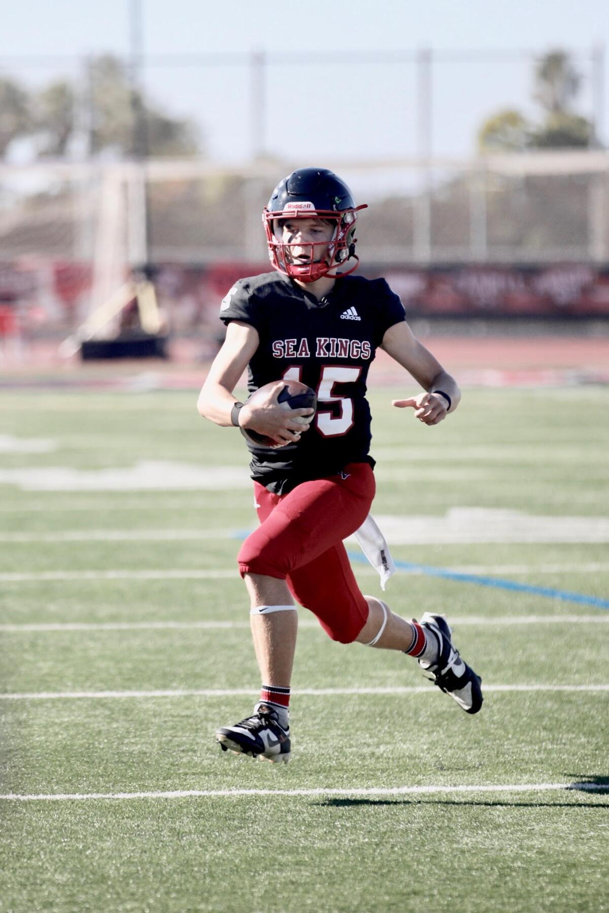 Quarterback Ryan Rakowski of Palos Verdes sprints out of the backfield during a game last season.