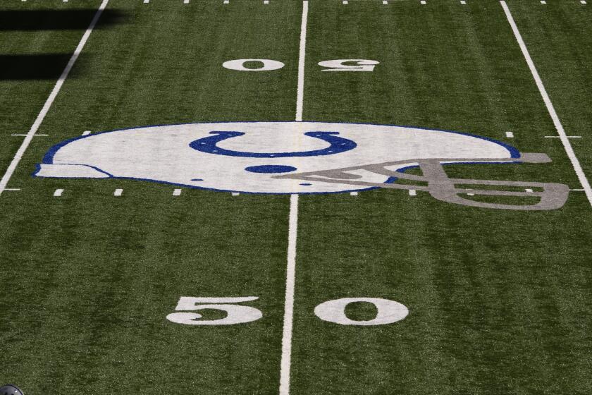 The Indianapolis Colts logo at mid field during an NFL football game between the Indianapolis Colts and Minnesota Vikings, Sunday, Sept. 20, 2020, in Indianapolis. (AP Photo/Zach Bolinger)