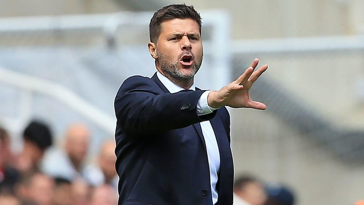 Tottenham coach Mauricio Pochettino shouts instructions to his players during their English Premier League game against Newcastle on Saturday.