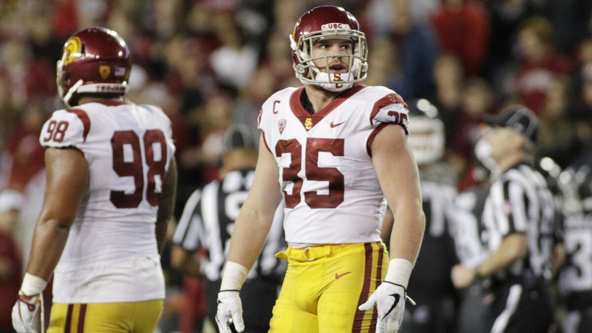 USC coach Clay Helton will look to linebacker Cameron Smith to be the leader of the Trojan's defense.