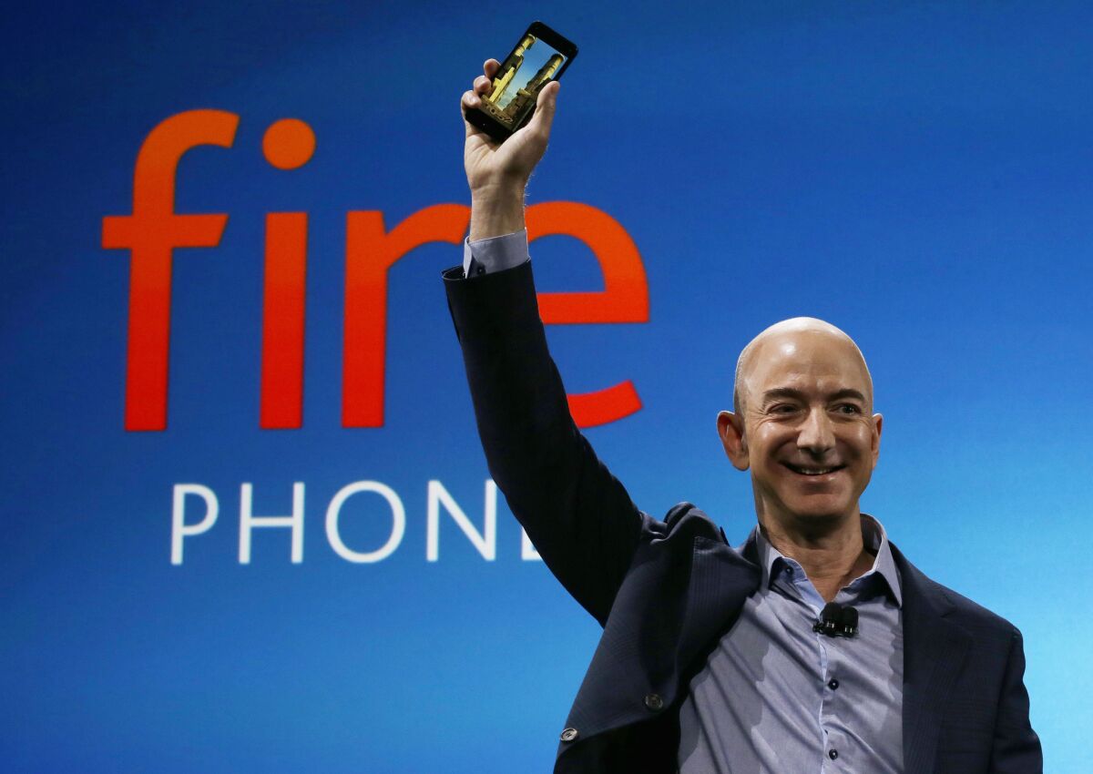 Amazon Chief Executive Jeff Bezos introduces the ultimately unsuccessful Fire Phone on June 18, 2014. He doesn't want to make the same mistake with Fire TV.