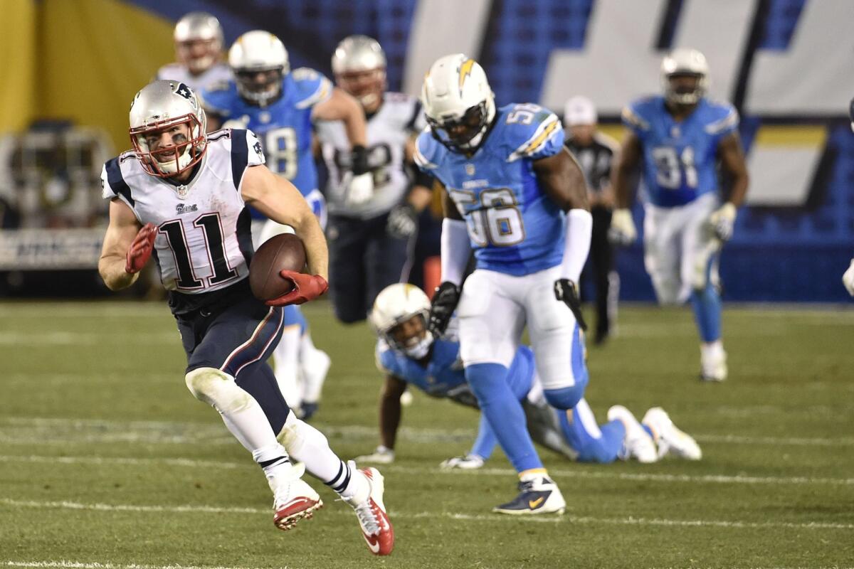 New England Patriots wide receiver Julian Edelman heads toward the end zone on a 69-yard pass play against the San Diego Chargers in the fourth quarter Sunday.