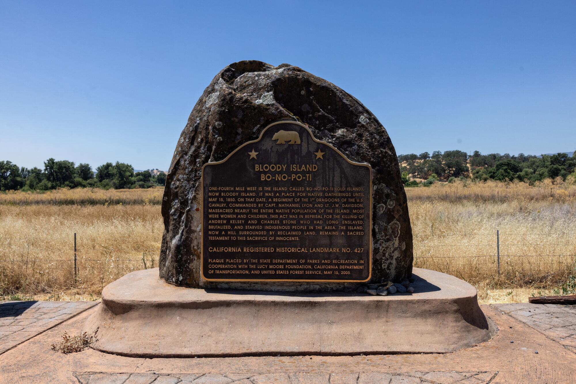 An engraved stone marks the site of the Bloody Island Massacre at Clear Lake in Lake County.