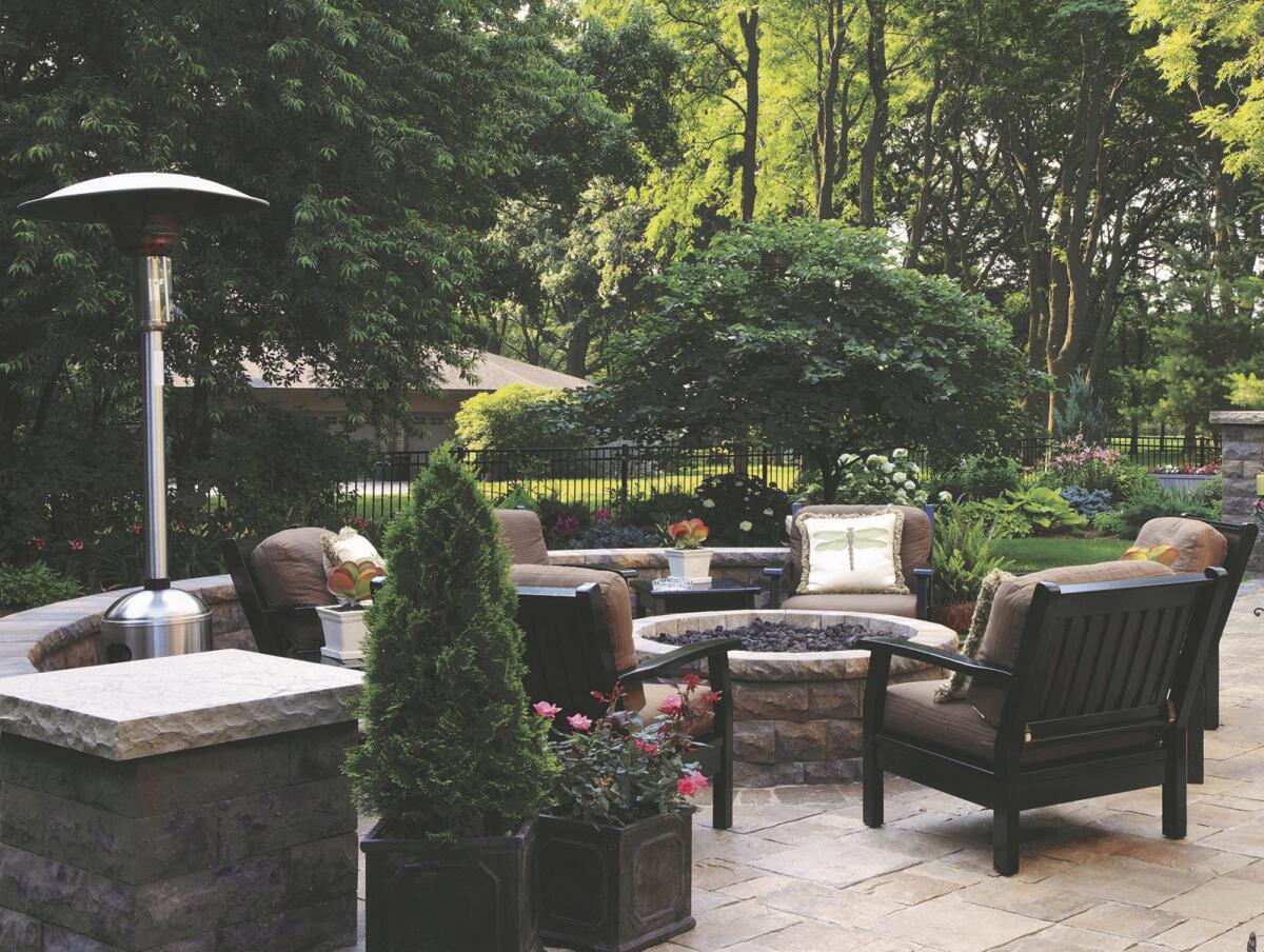 Lighting, heating and cooking equipment can turn your backyard into an entertaining oasis.