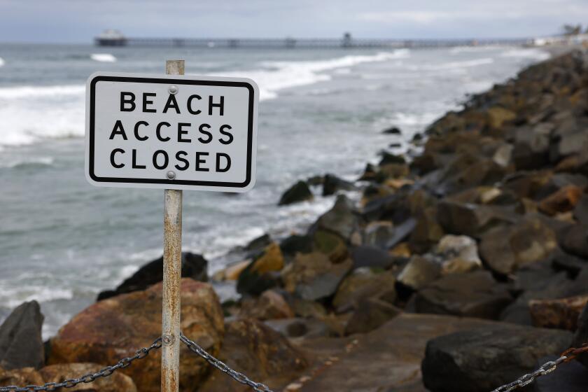 San Diego CA - April 4: Sand has diminished along the Oceanside coast, shown here along The Strand on Thursday, April 4, 2024. The city approved a plan to build artificial headlands to restore and retain beach sand. (K.C. Alfred / The San Diego Union-Tribune)