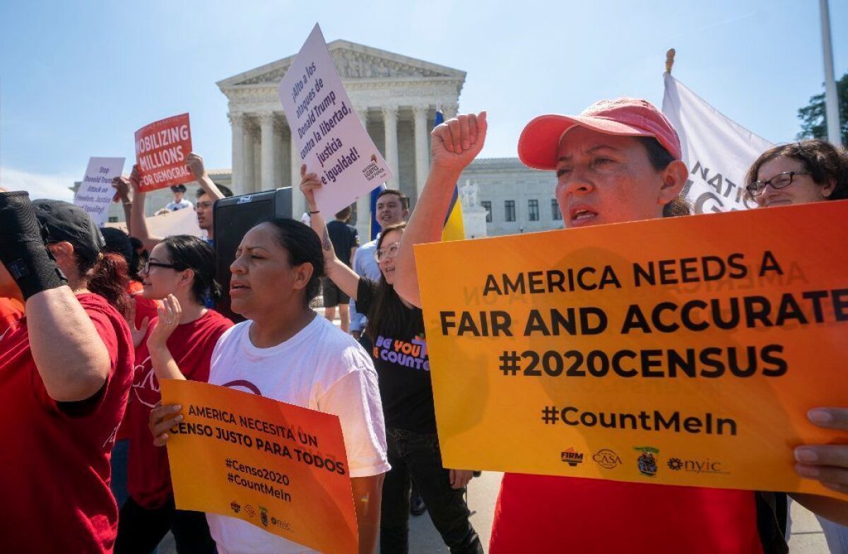 Demonstrators gather outside the Supreme Court in June before the justices’ decision to block the Trump administration’s plans to add a question about citizenship to the 2020 census.