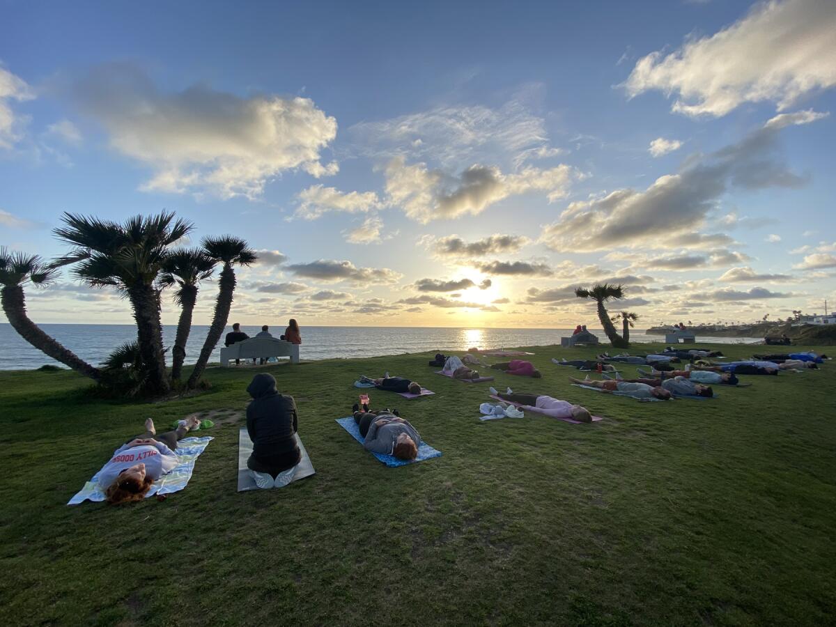 Participants in a PB Sunset Yoga class.