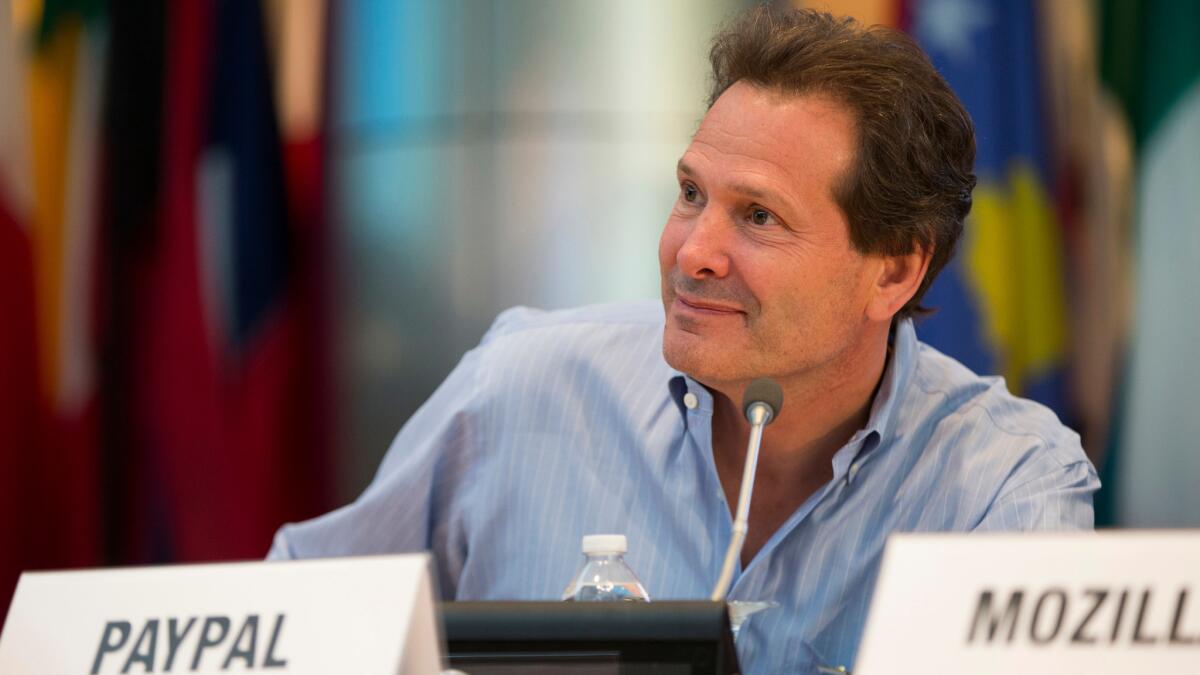 Paypal President and CEO Dan Schulman attends an event at the World Bank in Washington on April 14. Schulman said in a statement that PayPal is ending plans to hire 400 people for a new operations center in Charlotte, N.C.