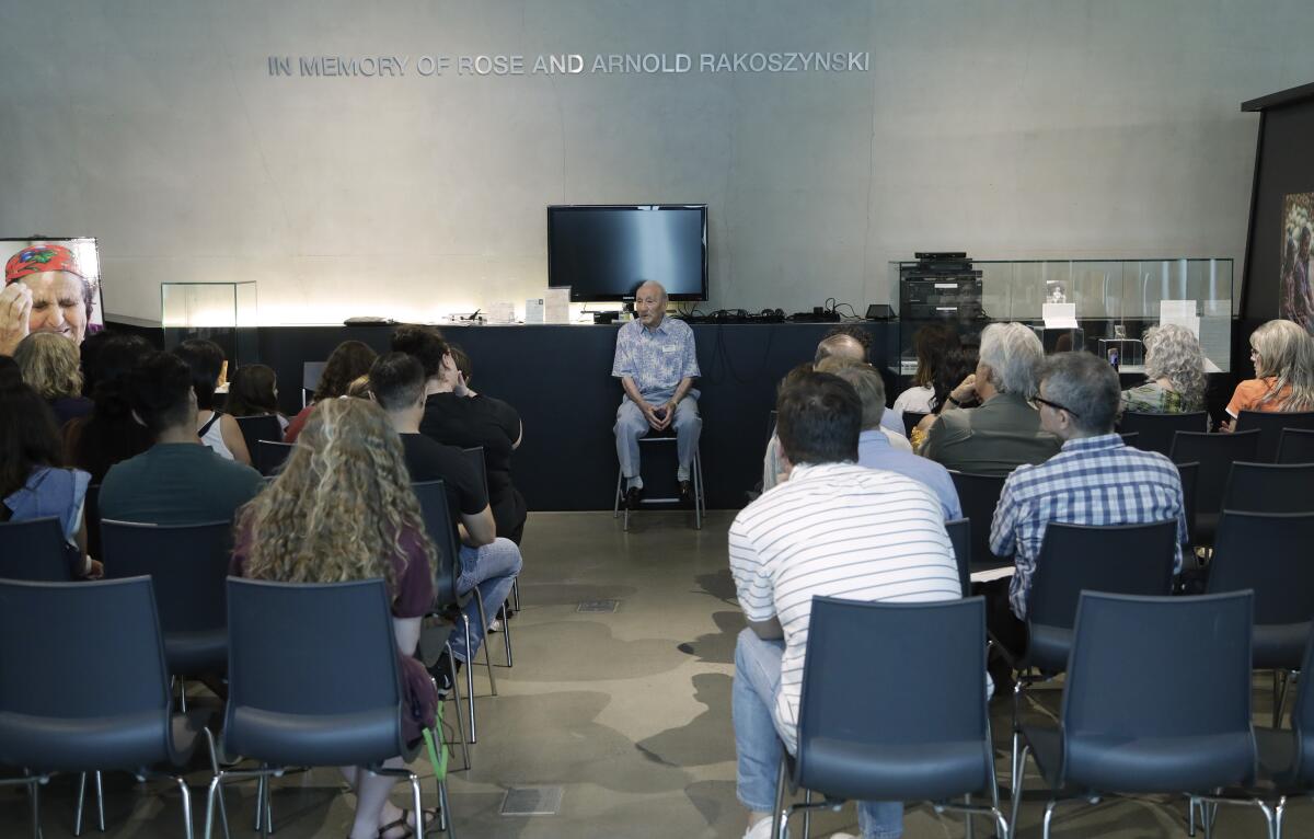 Holocaust survivor Joseph Alexander speaks at the Los Angeles Museum of the Holocaust