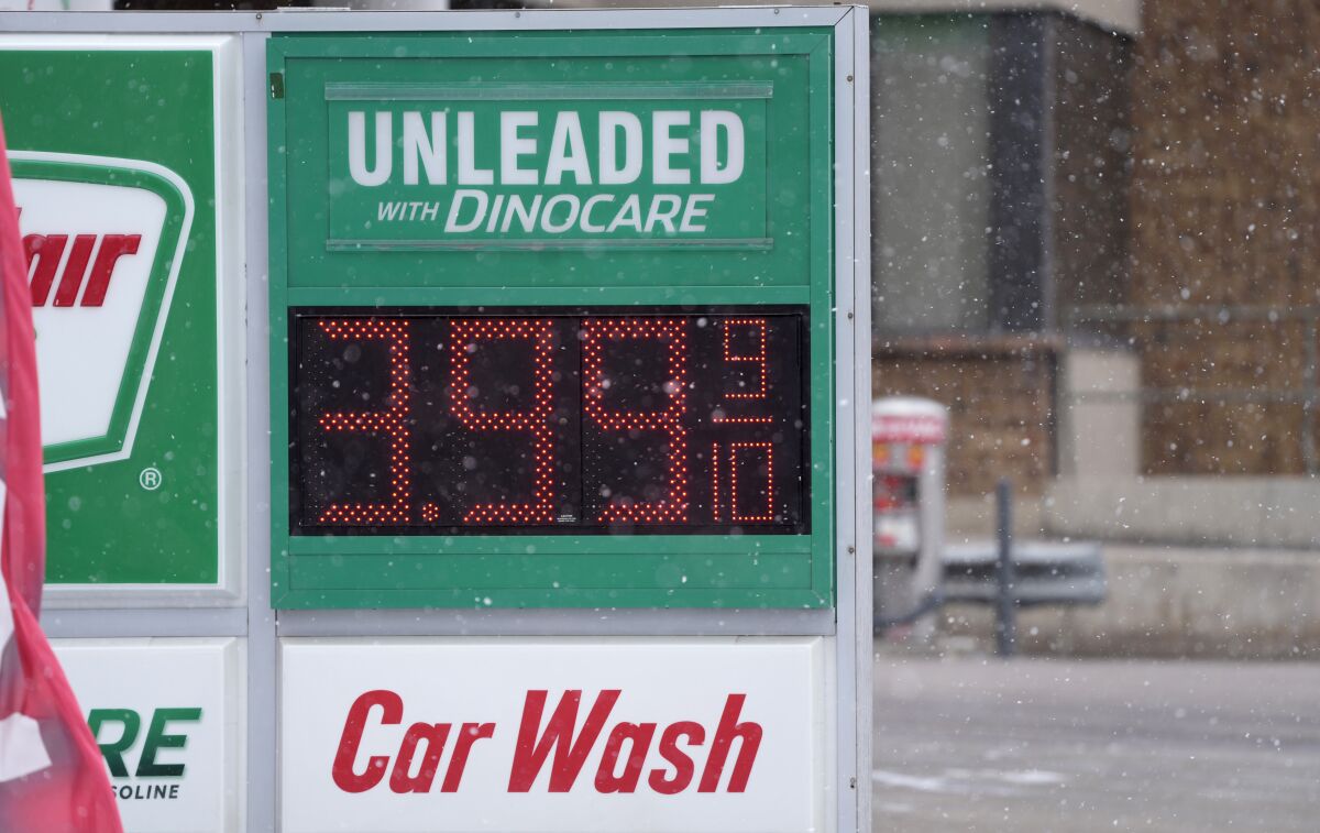 Price for a gallon of regular-grade gasoline is shown on a digital sign 
