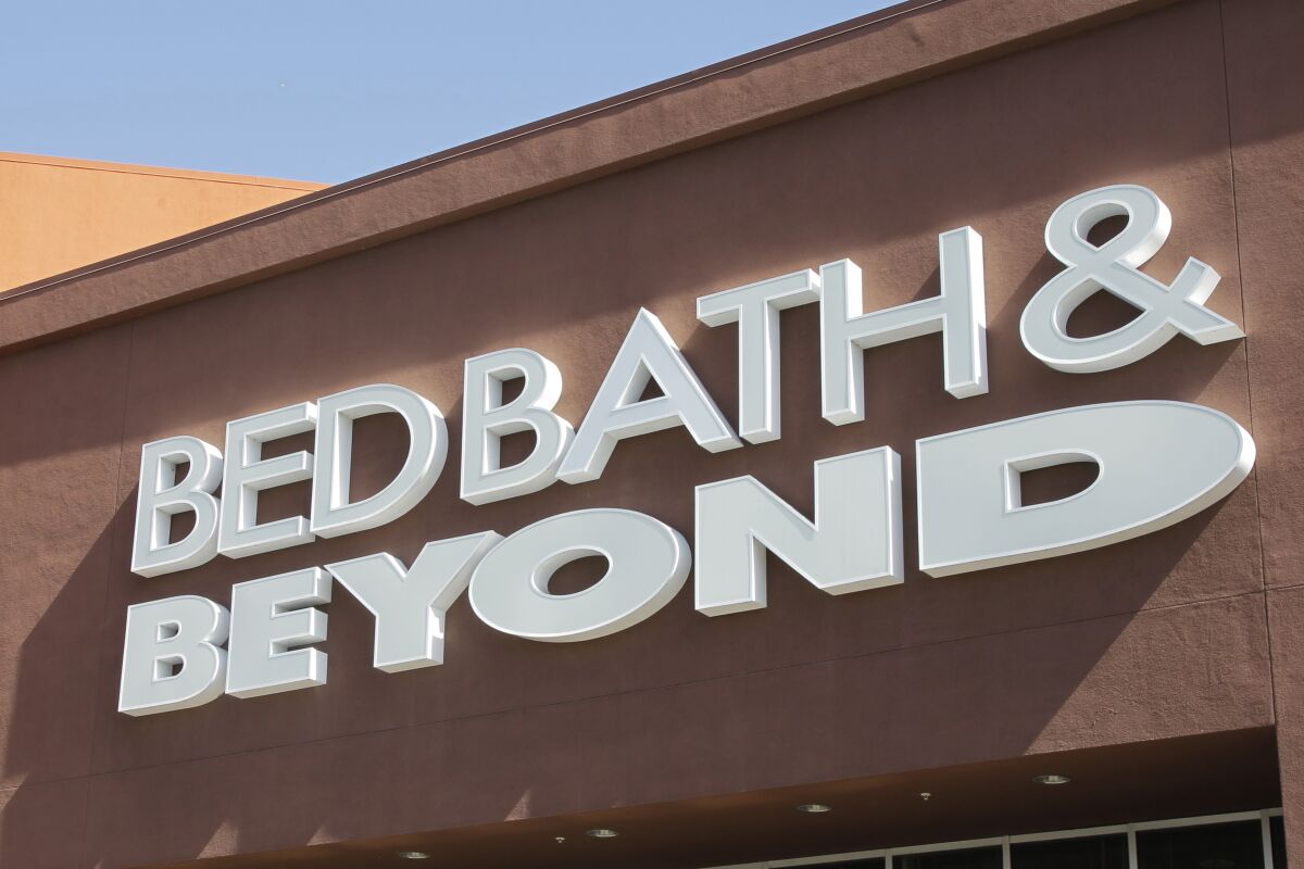 FILE - A Bed Bath & Beyond sign is shown in Mountain View, Calif., May 9, 2012. Shares in Bed Bath & Beyond jumped 22% to more than $25 per share Wednesday, Aug. 17, 2022, on huge trading volumes, and the mall-based home goods retailer’s stock has nearly quintupled in a little more than two weeks. If the price holds until the market closes, it will be the fourth straight day it has gained more than 20%. (AP Photo/Paul Sakuma, File)