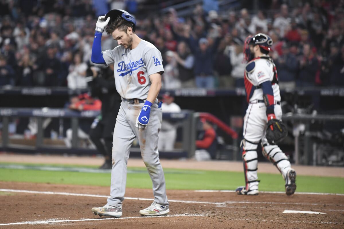 Dodgers second baseman Trea Turner reacts after striking out in the seventh inning.