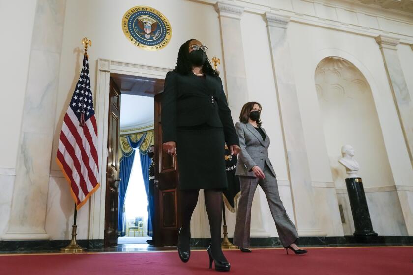 Judge Ketanji Brown Jackson arrives with Vice President Kamala Harris, right, where President Joe Biden will announce Judge Ketanji Brown Jackson as his nominee to be an Associate Justice of the U.S. Supreme Court at the White House in Washington, Friday, Feb. 25, 2022. (AP Photo/Carolyn Kaster)