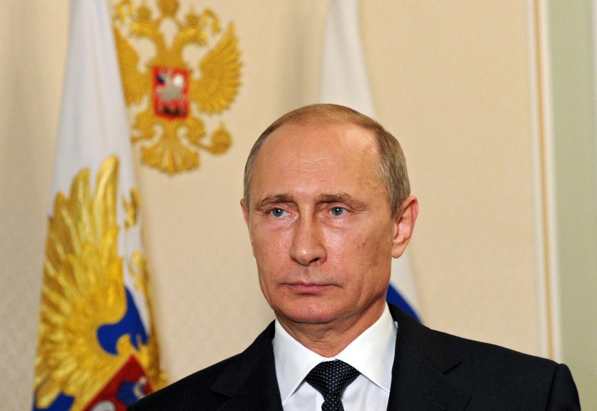 Russian President Vladimir Putin records a video address on the Malaysian Airlines jet downing.