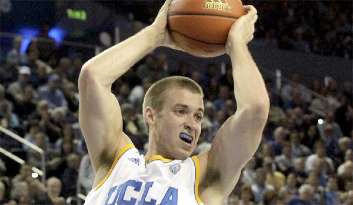 UCLA's Travis Wear is expected to return to the Bruins' lineup when they face No. 11 Arizona on Saturday after missing the previous two games due to a sprained right foot.