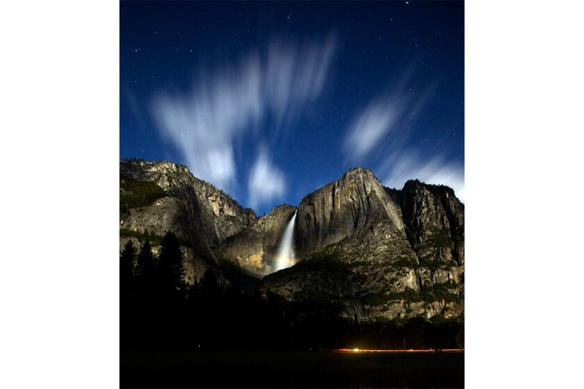 The movement of the clouds at 10 p.m. and slight rainbow can be seen at the base of Upper Yosemite Fall during a 30-second exposure.