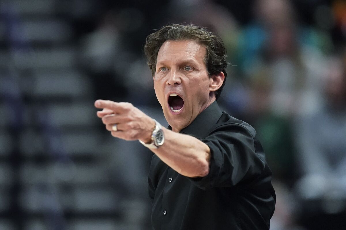 FILE - Utah Jazz coach Quin Snyder shouts to the team during the second half of an NBA basketball game against the Orlando Magic on Feb. 11, 2022, in Salt Lake City. On Sunday, June 5, 2022, Snyder resigned as coach of the Utah Jazz, ending an eight-year run where the team won nearly 60% of its games but never got past the second round of the playoffs. (AP Photo/Rick Bowmer, File)