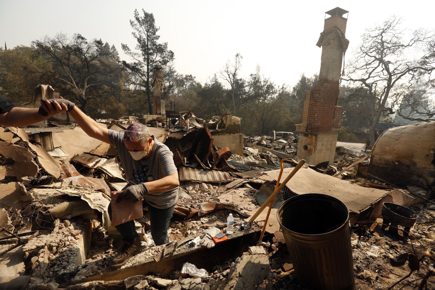 Some residents were allowed to return to their properties Friday in a neighborhood in Napa that was ravaged by the Atlas fire.