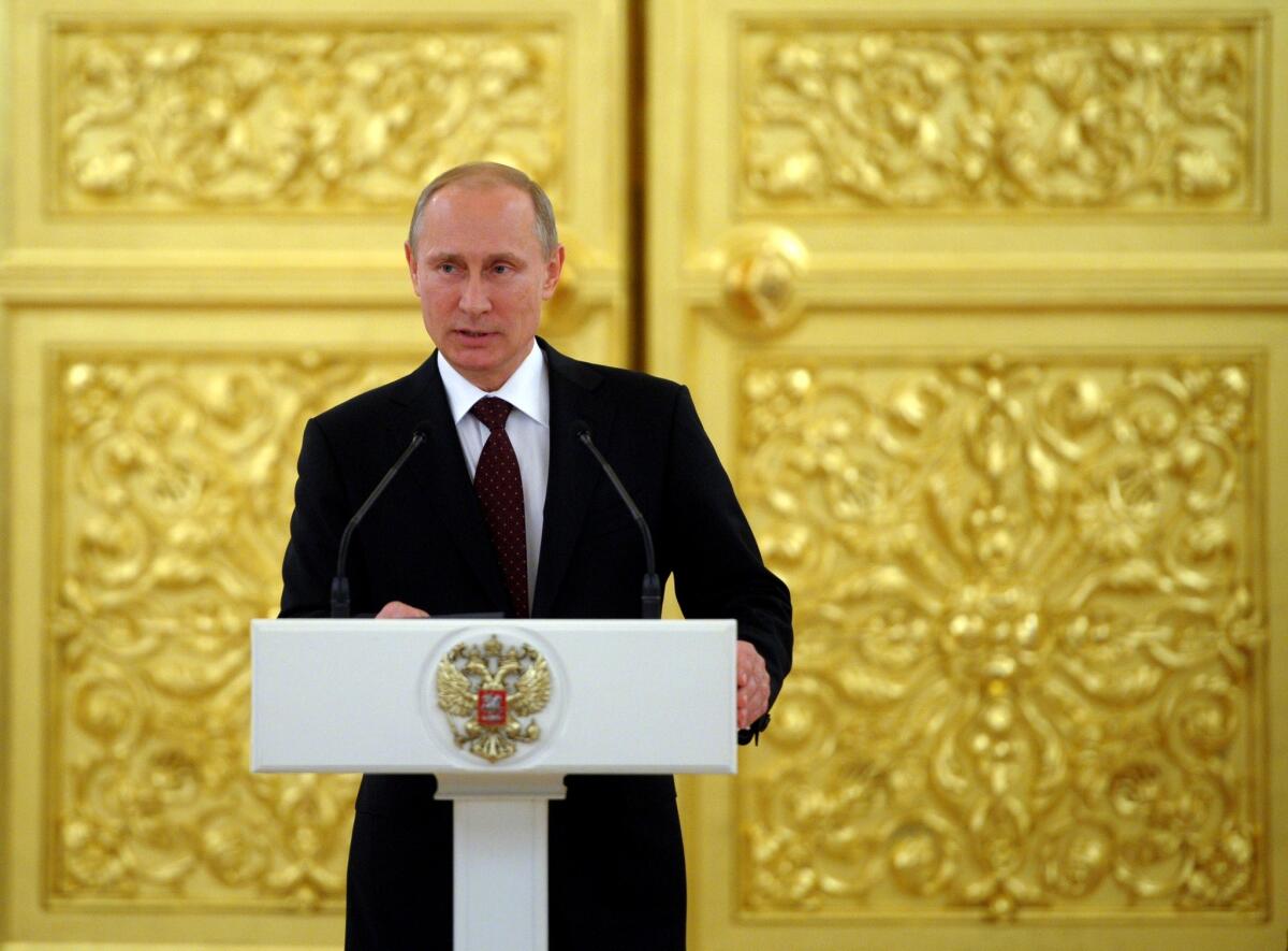 Russian President Vladimir Putin speaks at the Kremlin in Moscow.